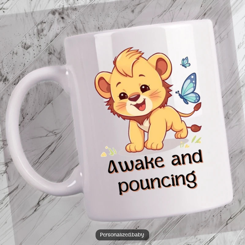 Funny mug showing a clumsy baby lion cub with big paws gleefully chasing a sparkling butterfly.