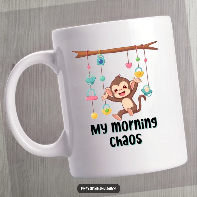 Funny Mug showing a mischievous monkey tangled in a mobile of dangling pacifiers, representing the delightful chaos of parenting.