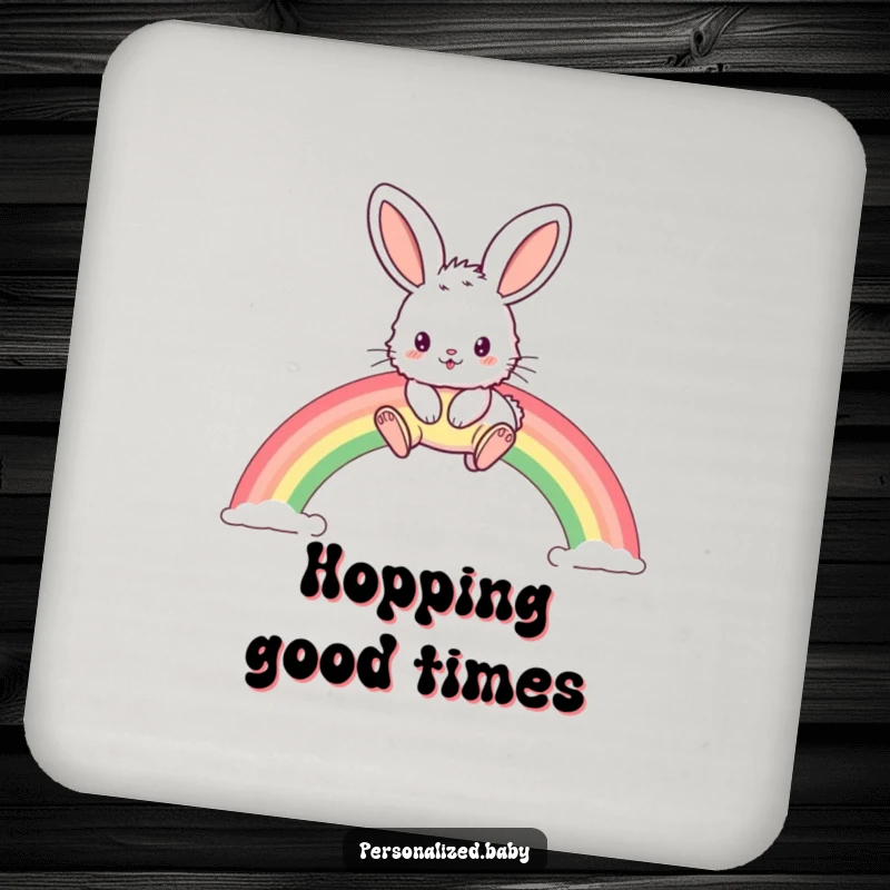 Funny drink coaster with a fluffy bunny and oversized ears hopping over a rainbow, protecting tabletops.