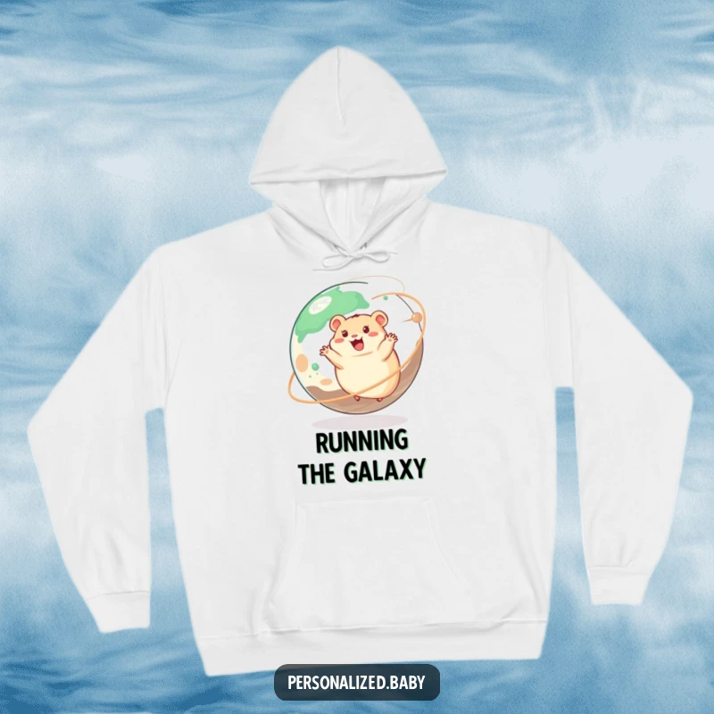 Funny hoodie with a happy hamster joyfully spinning on a giant planet, cozy and perfect for adventure.