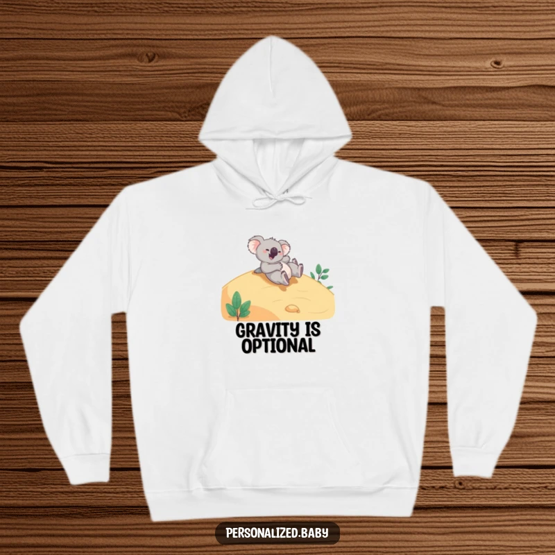 Funny Hoodie: A giggling koala bear tumbles playfully down a smooth hillside, embodying cozy fun and cheerful, carefree spirit.