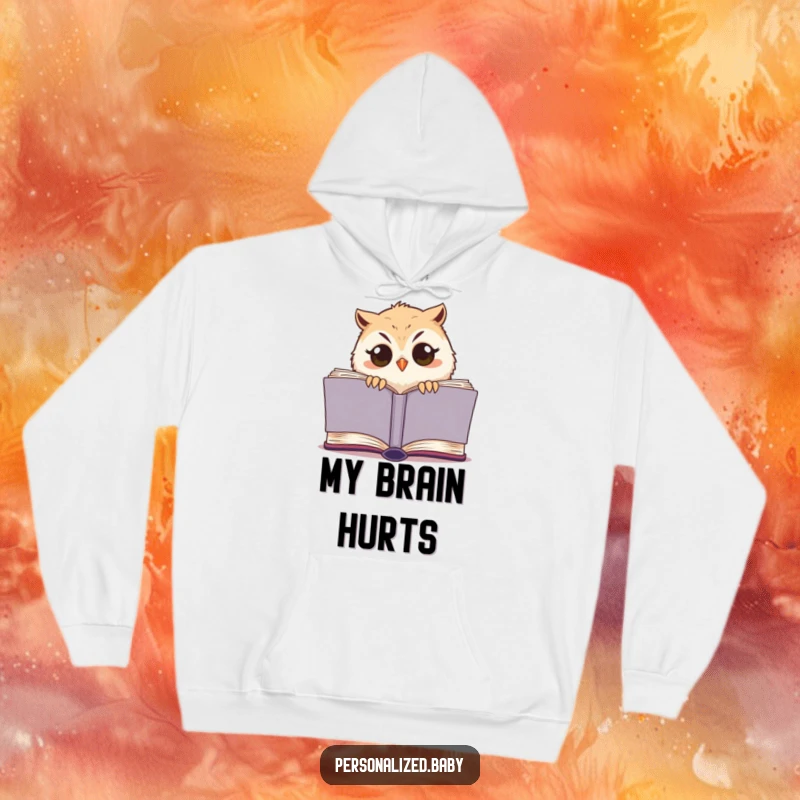 Funny owl chick hoodie, a sleepy bird with big eyes emerging from a book, ideal cozy and humorous apparel.