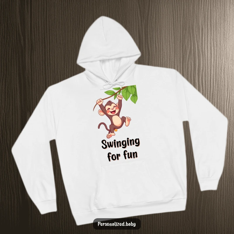 Funny baby monkey hoodie, swinging from a vine, laughing with pure delight, cozy and humorous apparel.