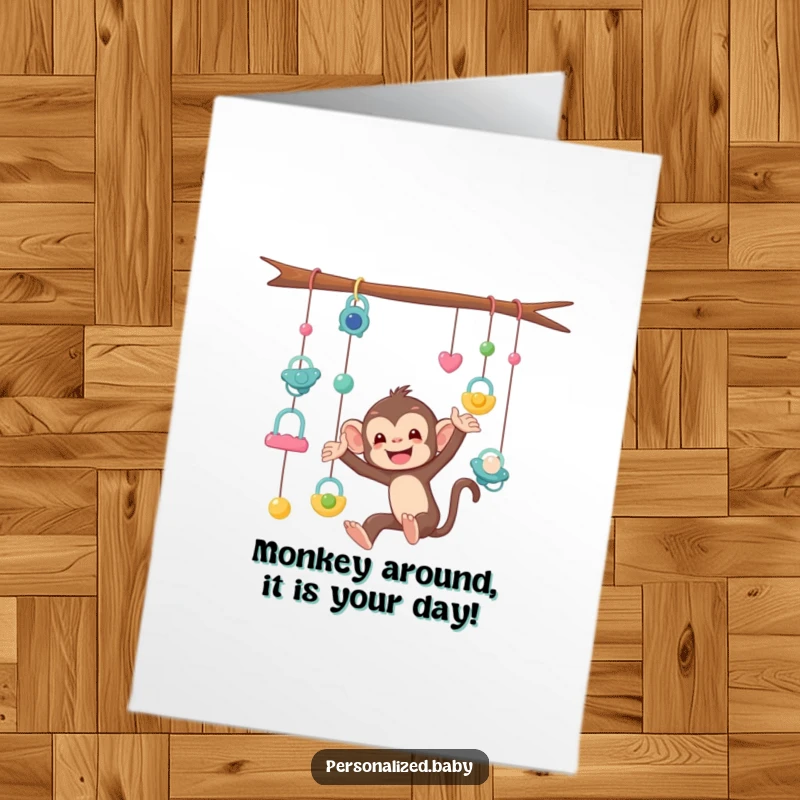 Funny Free Printable Birthday Card: A mischievous monkey character is tangled in a mobile of dangling pacifiers, causing playful chaos.