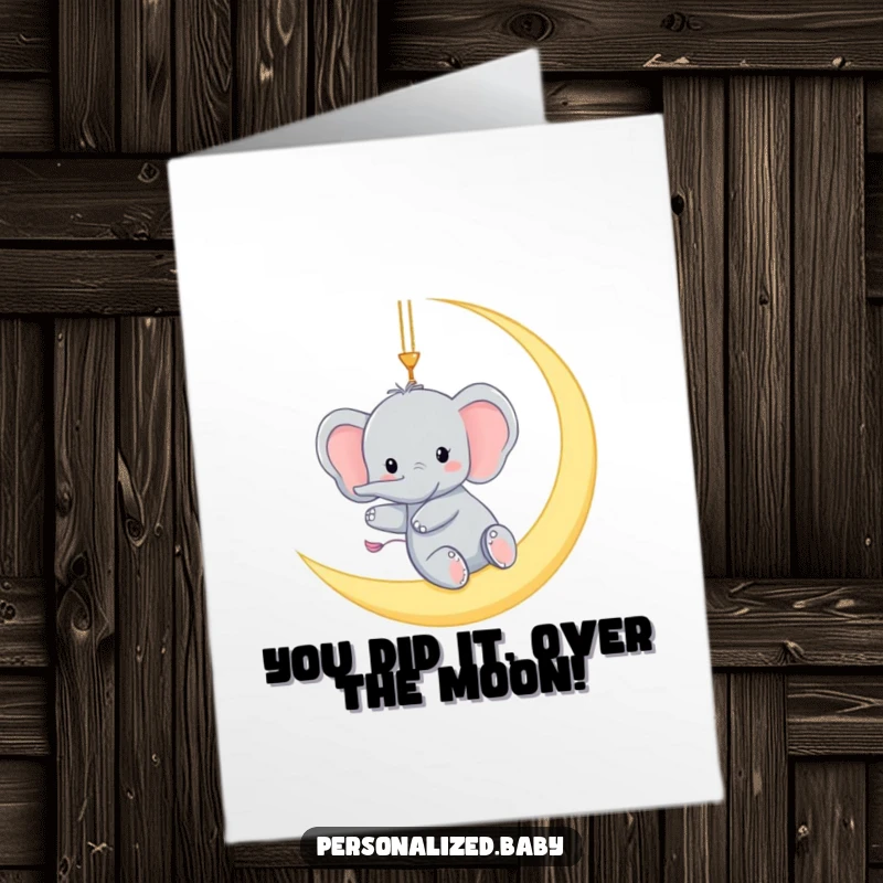 Funny Free Printable Elephant Congratulations Card: A tiny elephant gleefully swinging from a moon crescent, celebrating an achievement.