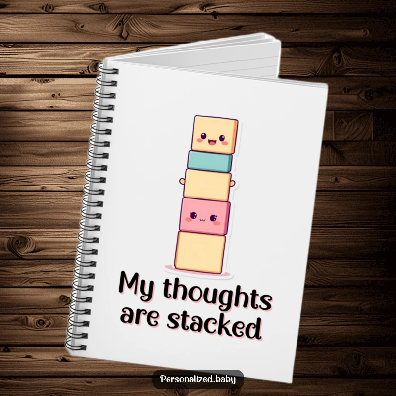 Funny smiling stacking block character in a precarious balancing act, a humorous notebook for jotting down funny ideas.