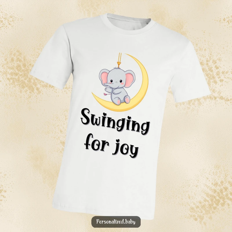Funny t-shirt with a tiny elephant gleefully swinging from a crescent moon, a whimsical and humorous celestial adventure.