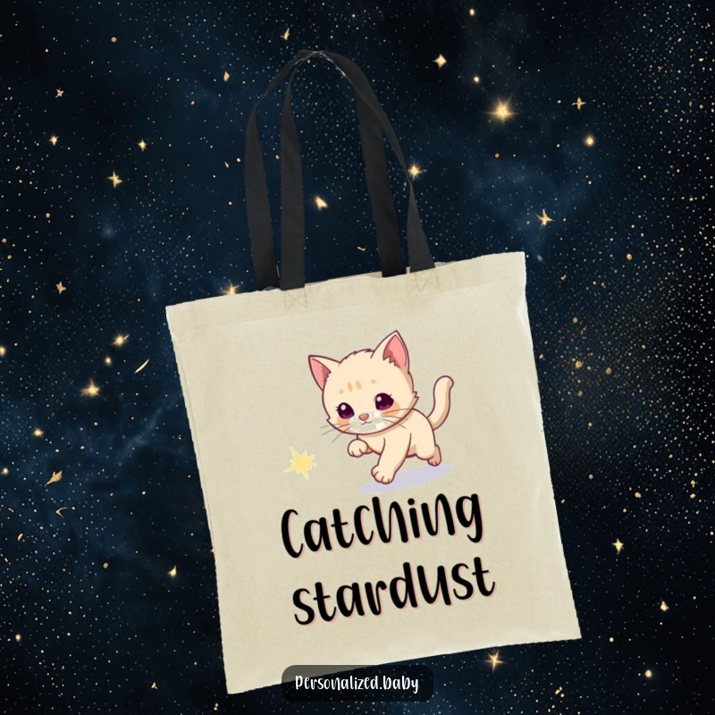 Funny tote bag with a curious kitten chasing a sparkly comet tail, bringing interstellar charm.